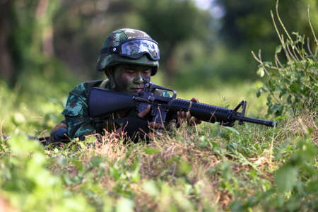 Hua Hin - December  03, 2013: Thai royal army soldier maneuver  03 december ,2013  in Pranburi , Prachuabkirikhan, THAILAND.のeditorial素材