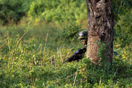 Hua Hin - December  03, 2013: Thai royal army soldier maneuver  03 december ,2013  in Pranburi , Prachuabkirikhan, THAILAND.のeditorial素材