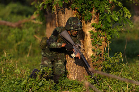 Hua Hin - December  03, 2013: Thai royal army soldier maneuver  03 december ,2013  in Pranburi , Prachuabkirikhan, THAILAND.のeditorial素材