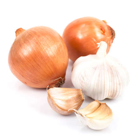 Onion and garlic clove isolated on white の写真素材