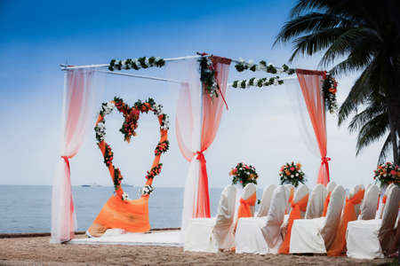 Beach Wedding Ceremony orange color themeの写真素材