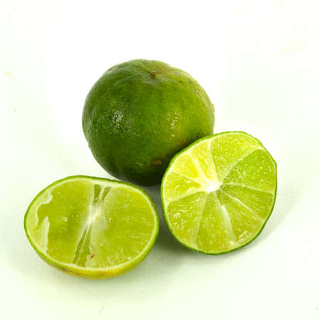 Fresh lime and slice, Isolated on white backgroundの写真素材