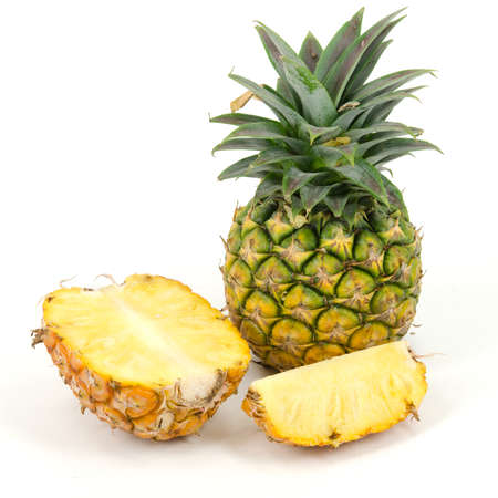 pineapple with slicesの写真素材
