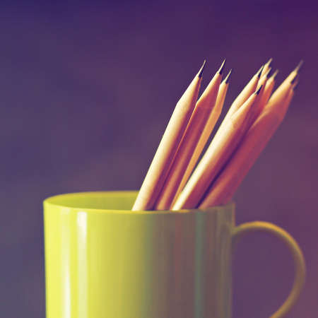 Pencils on the green cup の写真素材