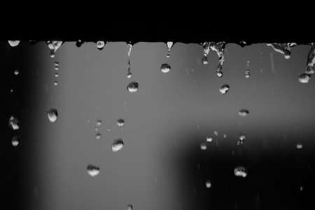 raining on the floor in vintage grain film tone styleの写真素材