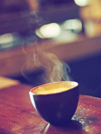 cup of coffee in coffee shop vintage colorの写真素材