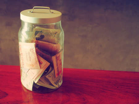  money in bottle vintage color tone の写真素材