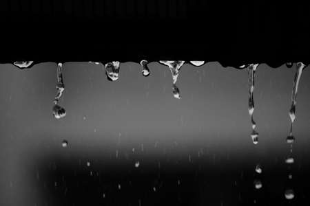 raining on the floor in vintage grain film tone styleの写真素材