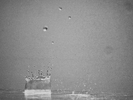  raining on the floor in vintage grain film black and white colorの写真素材
