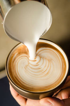 coffee latte art with milkの写真素材