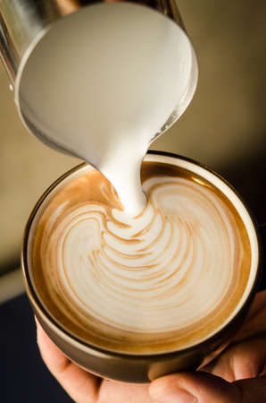 coffee latte art with milkの写真素材