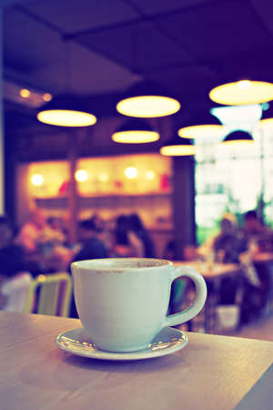 cup of coffee in coffee shop vintage colorの写真素材