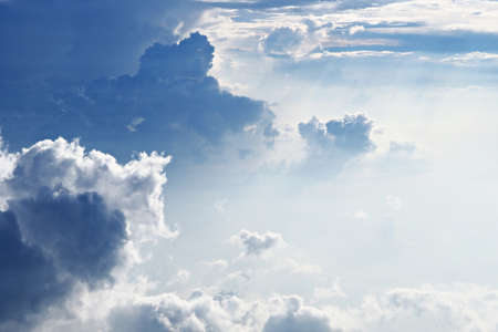 White Sky and Puffy Cloudsの写真素材