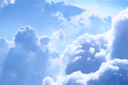 White Sky and Puffy Cloudsの写真素材