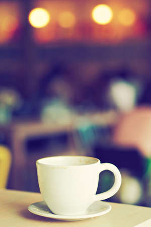 cup of coffee in coffee shop vintage colorの写真素材