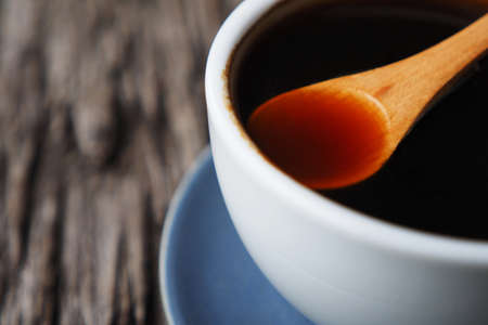 close up cup of coffee in coffee shop vintage colorの写真素材