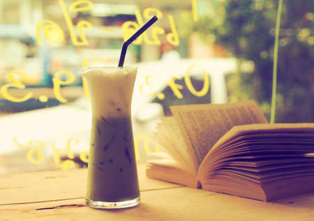 ice  green tea on the wood desk  in vintage tone colorの写真素材