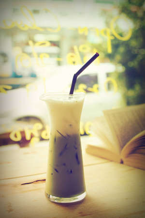 ice  green tea on the wood desk  in vintage tone colorの写真素材