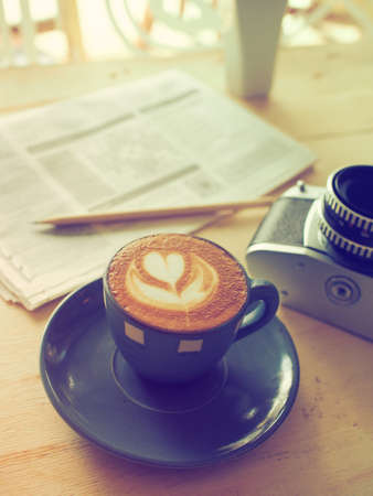 cup of coffee latte in coffee shop vintage colorの写真素材