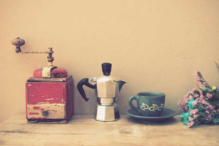 italian coffee maker and flower vintage color style tonedの写真素材