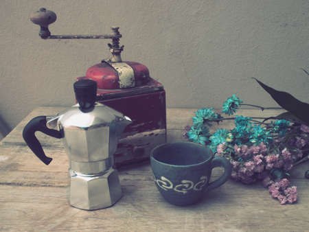 italian coffee maker and flower vintage color style tonedの写真素材