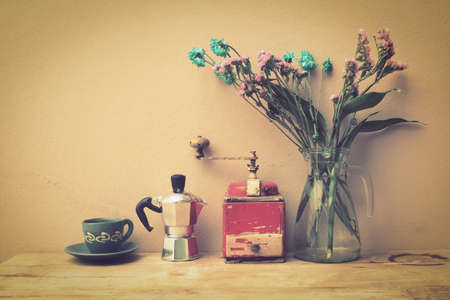 italian coffee maker and flower vintage color style tonedの写真素材