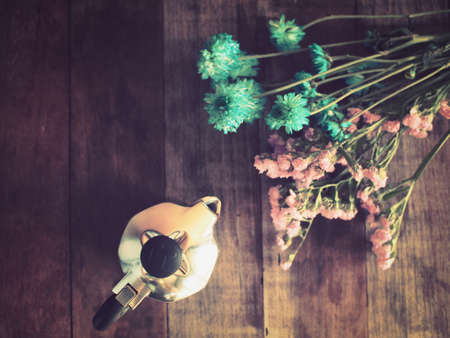 Italian coffee maker and flower vintage color style tonedの写真素材