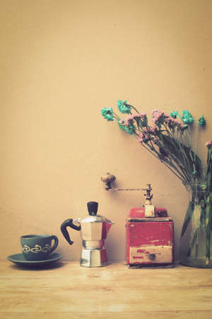 italian coffee maker and flower vintage color style tonedの写真素材