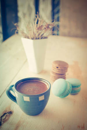 cup of coffee in coffee shop vintage color toneの写真素材