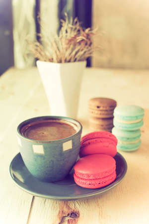 cup of coffee in coffee shop vintage color toneの写真素材