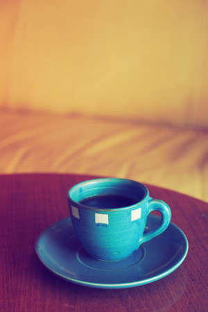 vintage color tone of  cup of coffee  on the table coffee shopの写真素材