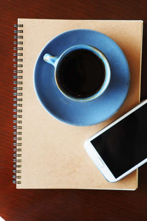 vintage color tone of  cup of coffee  on the table coffee shopの写真素材