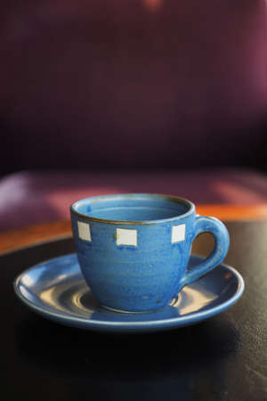 vintage color tone of  cup of coffee  on the table coffee shopの写真素材