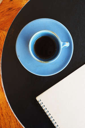 vintage color tone of  cup of coffee  on the table coffee shopの写真素材