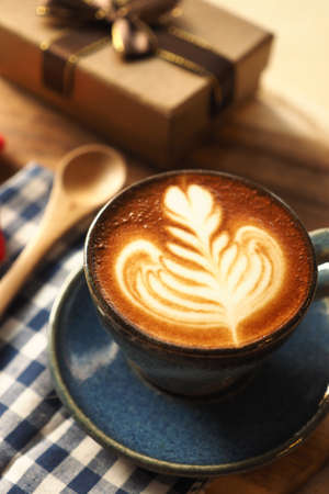 vintage color tone of  cup of coffee  on the table coffee shopの写真素材
