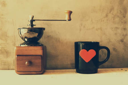 vintage color tone : cup of coffee in coffee shopの写真素材