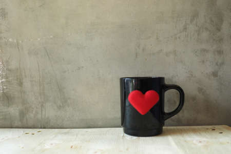 vintage color tone style : cup of coffee in coffee shopの写真素材