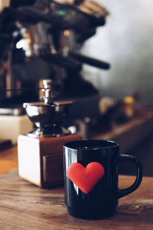 vintage color tone : cup of coffee in coffee shopの写真素材