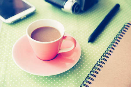 Cup of Coffee in coffee shop vintage color tone styleの写真素材
