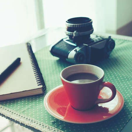 Cup of Coffee in coffee shop vintage color tone styleの写真素材