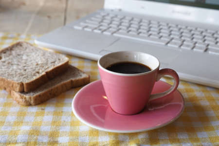 Cup of Coffee in coffee shop vintage color tone styleの写真素材