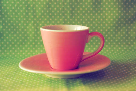 Cup of Coffee in coffee shop vintage color tone styleの写真素材