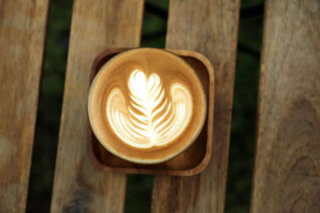 vintage color tone of  cup of coffee  on the table coffee shop