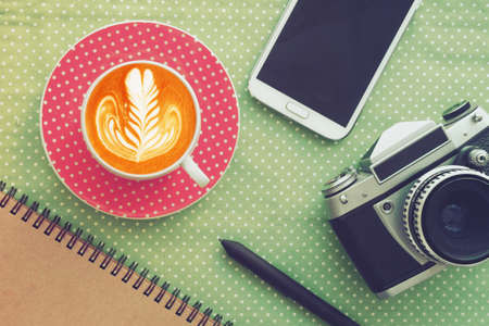 Cup of Coffee in coffee shop vintage color tone styleの写真素材