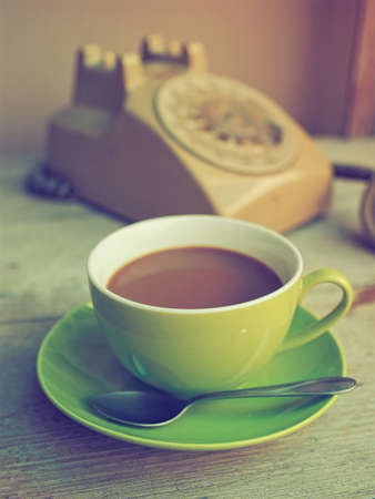 coffee on the wood texture vintage color toneの写真素材