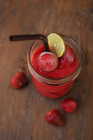 Fresh Blueberry and Strawberry Smoothie on a backgroundの写真素材
