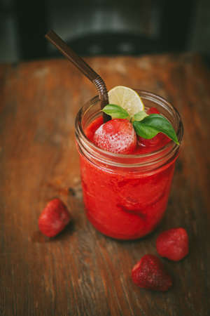 Fresh Blueberry and Strawberry Smoothie on a backgroundの写真素材