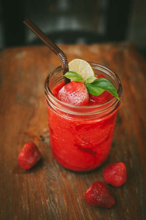 Fresh Blueberry and Strawberry Smoothie on a backgroundの写真素材