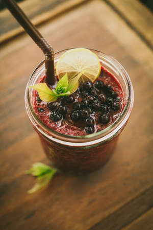 Fresh Blueberry and Strawberry Smoothie on a backgroundの写真素材