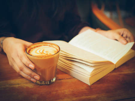 Asian woman drinking coffeeの写真素材